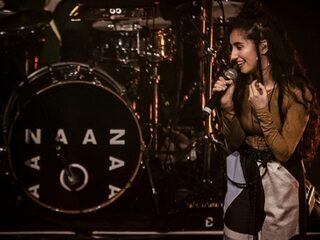 Naaz is te horen tijdens de show van U2 in een stampvolle Ziggo!