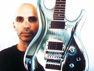 Satriani klaagt Coldplay aan voor plagiaat