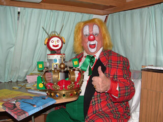 Op de foto met clown en baby Bassie