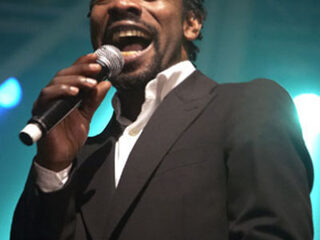 Clarence Milton Becker te gast bij Giel