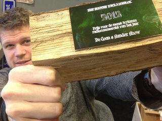 Stem op Het Houten Reclameblok