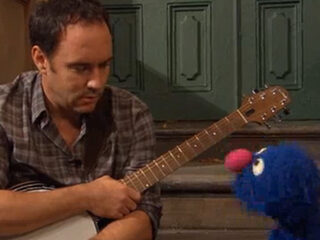 Dave Matthews in duet met Grover van Sesamstraat