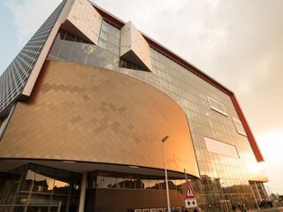 Welke band poepte ooit op het dak van Tivoli?