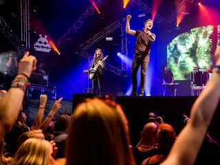 Domien praat bij met Imagine Dragons