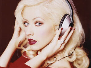 Ook Aguilera coach bij The Voice