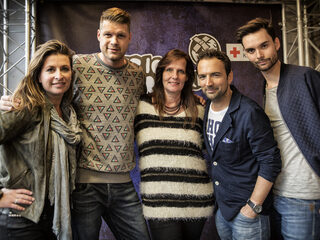 Sacha de Boer met zelfgeschoten foto voor de 3FM SR14 Veiling