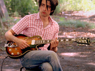 dEUS-gitarist in etalage