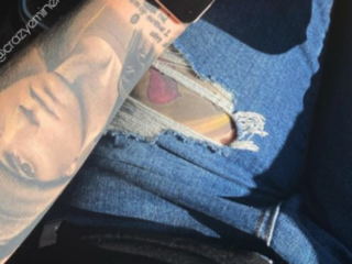 Vrouw verbreekt record: 16 portret-tattoos van Eminem