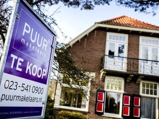 'Huizenprijzen volgend jaar 2 procent omlaag'