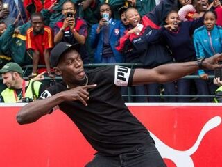 Usain Bolt geeft cadeau aan Nederlandse Olympische medaillewinnaars