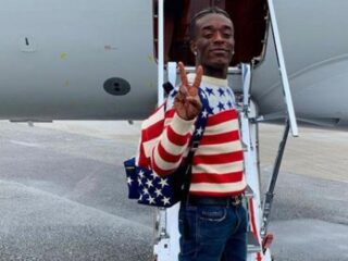 Security ziet Lil Uzi Vert aan voor een fan en probeert hem van het podium te halen