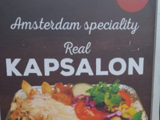 Amsterdam en Rotterdam ruziën om kapsalon