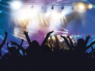 Doorverkopers dure concertkaartjes: slimme zakenmensen of oneerlijke afzetters?