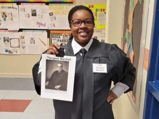 Lerares verkleedt zich als Afro-Amerikaanse rolmodellen tijdens Black History Month