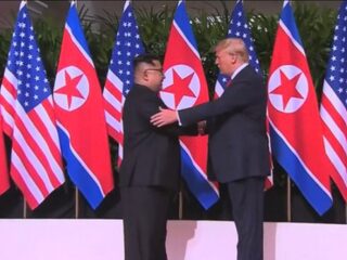 Drie redenen waarom de handdruk tussen Kim Jong-un en Trump een big deal is