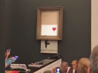 Banksy-kunstwerk versnippert zichzelf na bod van 1,1 miljoen euro