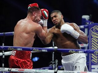 Anthony Joshua verdedigt wereldtitels met overtuigende overwinning