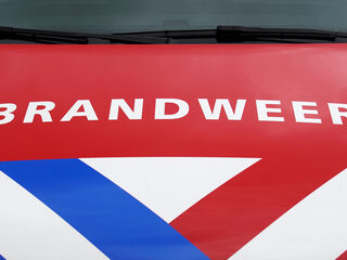Twaalf woningen ontruimd na grote brand in Rotterdamse flat