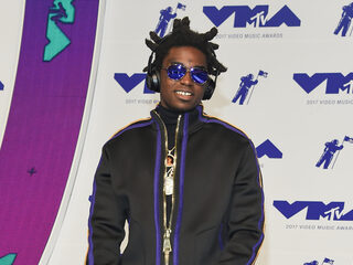 Kodak Black verrast 7-jarig zoontje met diamanten grill