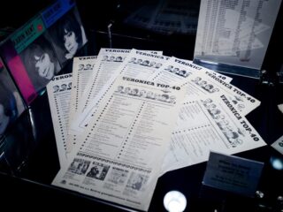 Podcast De Dag: verslaafd aan muzieklijsten