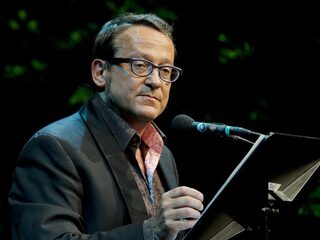 Nederlanders ‘trots’ en ‘nuchter’? Onzin, zegt Vlaming Tom Lanoye