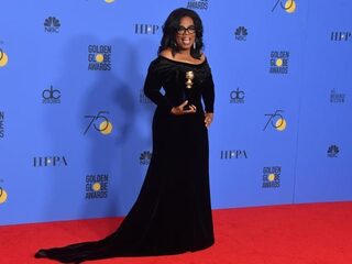 Golden Globes: Geen verrassingen, sterren in het zwart en Oprah stal de show