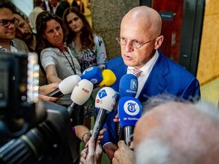 Grapperhaus en Snel: 'beiden toeristen op hun eigen ministerie'