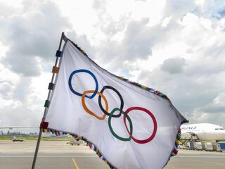 Het verhaal achter de Olympische vlag