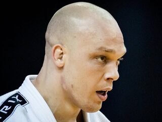 Judoka Henk Grol klopt rivaal Roy Meyer