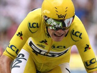 Froome blijft overeind in tijdrit, Urán passeert Bardet