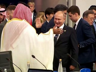 Poetin en kroonprins Mohammed gebroederlijk op G20-top