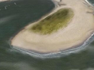 De Zandmotor werkt, maar langzamer dan verwacht