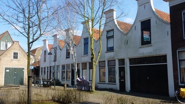 Hoe de overheid de overspannen woningmarkt moet aanpakken