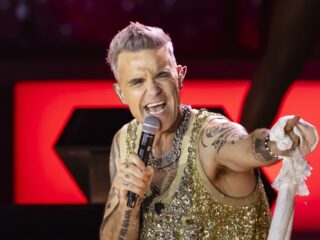Robbie Williams brengt dancealbum uit bij platenfirma Armin van Buuren