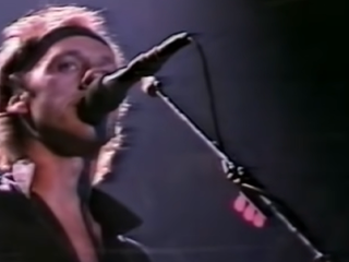Dire Straits brengt publiek in Sydney in trance met Brothers In Arms