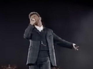 Publiek gaat los tijdens Killer / Papa Was A Rollin' Stone van George Michael