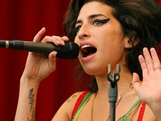 Amy Winehouse schreef drankprobleem van zich af op Rehab