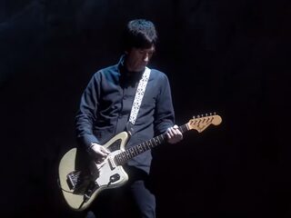 Johnny Marr en Hans Zimmer vergezellen Billie Eilish op podium