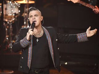 Robbie Williams wees aanbod af om Queen-frontman te worden