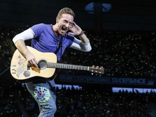 Ruud de Wild belt met Coldplay-zanger Chris Martin