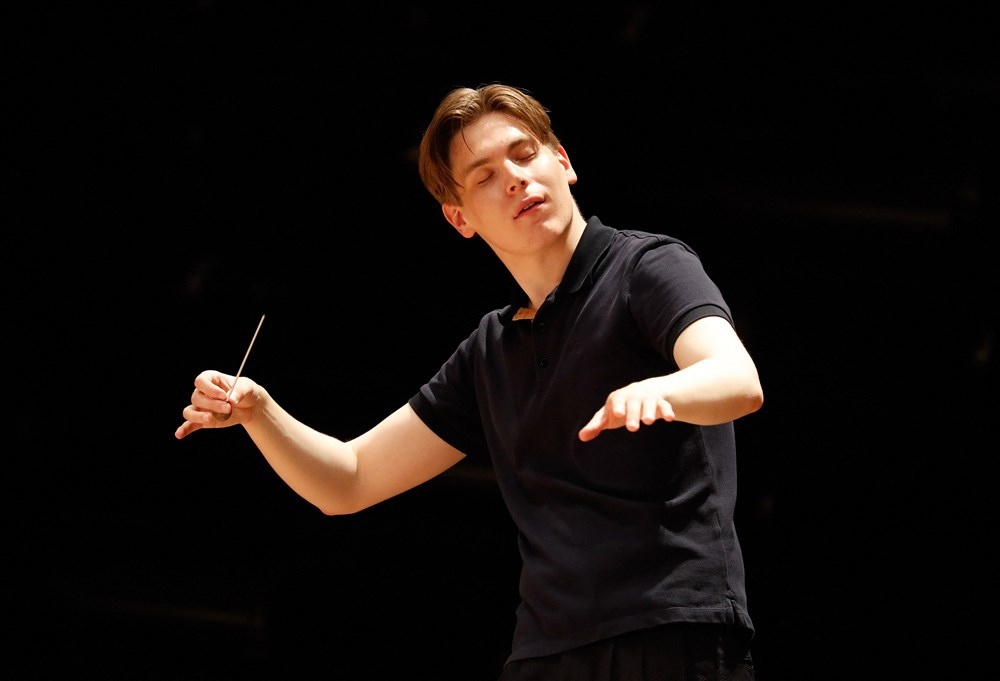 Finnish conductor Klaus Makela conducts the Paris' Orchestra during a rehearsal at the Philharmonie de Paris concert hall on July 7, 2020.