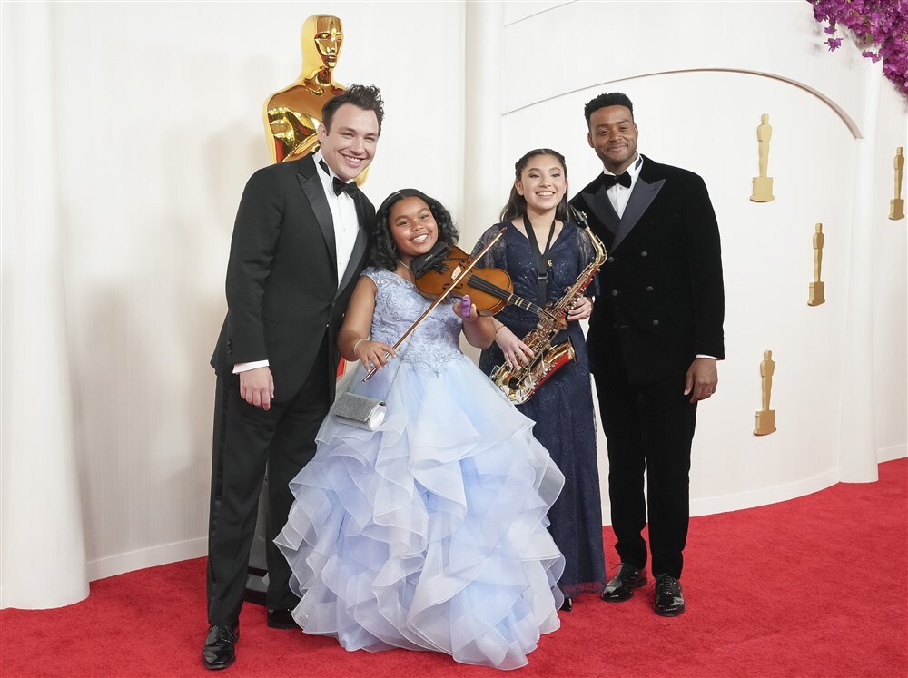 Ben Proudfoot, Porché Brinker, Ismerai Calcaneo and Kris Bowers arrive for the 96th annual Academy Awards ceremony at the Dolby Theatre in the Hollywood neighborhood of Los Angeles, California, USA, 10 March 2024. The Oscars are presented for outstanding