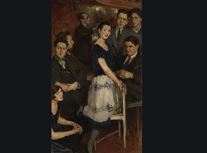 Een schilderij waarop 8 mensen afgebeeld staan. In het midden leunt de pianiste Marcelle Meyer in een blauw met witte jurk op een stoel. Links zitten Germaine Tailleferre, Darius Milhaud, Arthur Honegger en Jean Wiener. Rechts staan Francis Poulenc en Jea