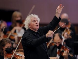 Domper voor dirigent Simon Rattle: nieuwbouw zaal München onzeker