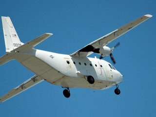 In de cockpit? Of achter de vleugel?