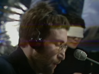 Op de band: Instant Karma!